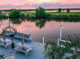 Waterfront Villa with Deck 23 Mi to French Quarter!, hotel in Venetian Isles