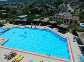 Telhinis Hotel & Apartments, ξενοδοχείο στο Φαληράκι