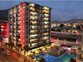 Granada City Alanya Luxury Appartment 800м от пляжа Клеопатра, hotel com banheiras de hidromassagem em Alanya