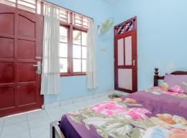 Losmen Parikesit, δωμάτιο σε οικογενειακή κατοικία σε Bantul