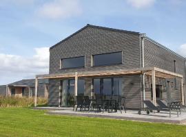 Gud Jard Chalet Nr 14 - Design-Ferienhaus mit exklusiver Ausstattung, Hotel in Pellworm