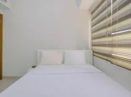 Minimalist and Posh 1BR The Oasis Cikarang Apartment By Travelio