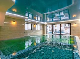 Amarena SPA Hotel - Breakfast included in the price Spa Swimming pool Sauna Hammam Jacuzzi Restaurant inexpensive and delicious food Parking area Barbecue 400 m to Bukovel Lift 1 room and cottages, hotell i Bukovel