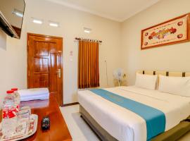 Guesthouse Nusa Indah Syariah 2, habitación en casa particular en Batu