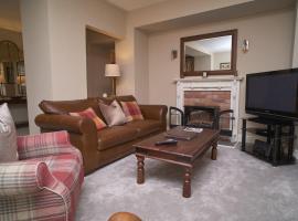 Old Bakers Cottage ground floor apartment centrally located in Grasmere with patio area, βίλα σε Grasmere