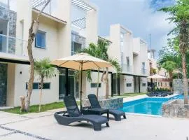 Increíble estudio en Puerto Aventuras, Condominio con alberca # 201