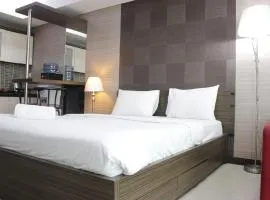 Prime and Comfy Studio at Tamansari La Grande Apartment By Travelio