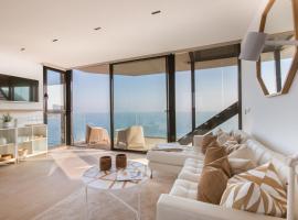 Modern sea front jacuzzi Blue Sky