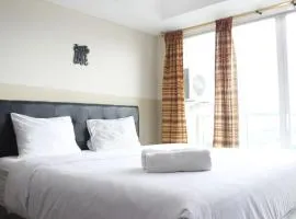 Modern Studio Room at Tamansari La Grande Apartment By Travelio
