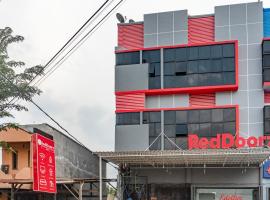 RedDoorz Plus near Millenium ICT Centre Medan 2, sewaan penginapan di Pulauberayan