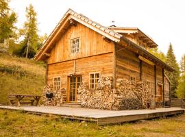 Almhütte Chalet HIRSCHFISCH, cabin in Bodensdorf