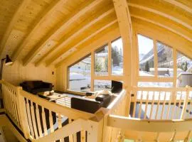 Ferienhaus Alpen Lodge und die Gams