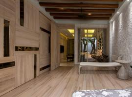 Blossom Motel, hotel v destinaci Puxin