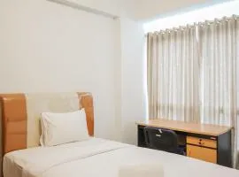 Comfy and Minimalist Studio Apartment Scientia Residence Tower B By Travelio