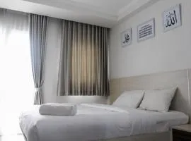 Comfy and Strategic Studio Signature Park Grande Apartment By Travelio
