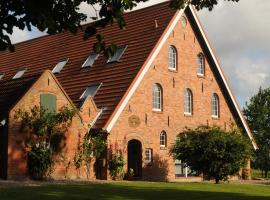 Der Deichhof - Ferienwohnungen, hotel in Wremen