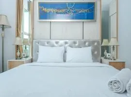 Minimalist and Comfy 1BR CitraLake Suites Apartment By Travelio