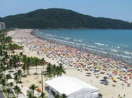 PRAIA GRANDE APARTAMENTO TEMPORADA com ar condicionado, hotel em Praia Grande