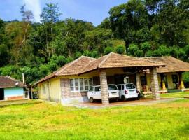 Meghagiri homestay, hotel with parking in Chārmādi