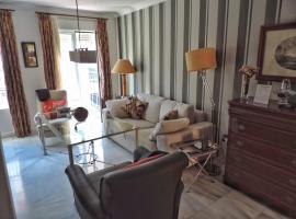 Duplex, terraza, 10 min coche centro Sevilla, hotel with parking in Camas