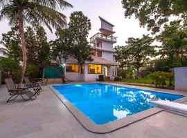 StayVista's Santoni Farms - Riverside Bliss with Pool, Orchard & Activities