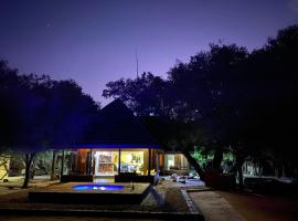 Viesnīca Twiga Lodge Mabalingwe pilsētā Belabela, netālu no apskates objekta Parking (Koro-Koro Safari Lodge)