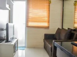 Minimalist 2BR Green Pramuka City Apartment near Shopping Mall By Travelio