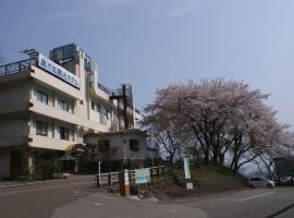 Oyashirazu Kanko Hotel, хотел с паркинг в Itoigawa