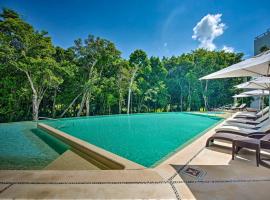 Luxe Tao Riviera Resort Condo with Beach and Golfing! – hotel w mieście Akumal