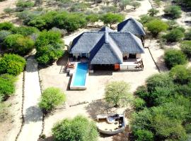 Beautiful Mountain Views From A 2-Bedroom Home With Pool, hotel u blizini znamenitosti 'Kinyonga Reptile Centre' u gradu 'Hoedspruit'