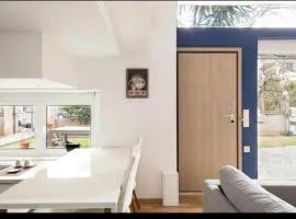 BRIGHT MEZZANINE FLAT WITH GARDEN