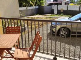 Appartement charmant à Saint Pierre 44 m² avec jardin clôturé