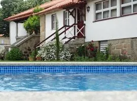 3 bedrooms house with lake view shared pool and enclosed garden at Vouzela