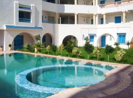 One bedroom appartement at Akouda 200 m away from the beach with shared pool and enclosed garden, smještaj uz plažu u gradu 'Port El Kantaoui'