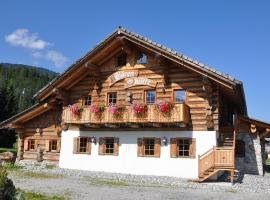 Bärenhütte Tröpolach-Nassfeld, хотел в Jenig