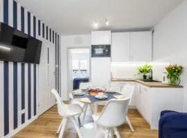 Apartament 1B Niebieskie Apartamenty Poddąbie z basenem krytym, odkrytym, salą zabaw, animacjami