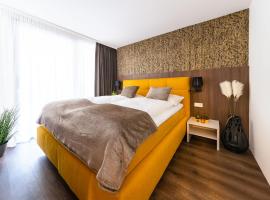 Gerharts Premium City Living - Modern apartments - center of Brixen with free parking and Brixencard - ideal for couples, families, business trips, guests with dogs, apartment in Bressanone