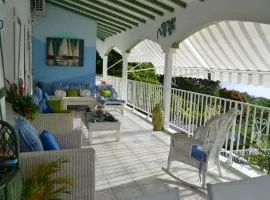 Propriete de 3 chambres avec vue sur la mer piscine partagee et jardin clos a Deshaies a 2 km de la plage
