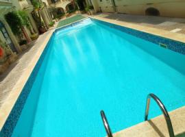 3 bedrooms maisonette with pool, hotel sa Għajnsielem