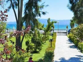 Amarynthos Beachfront Vacation House with garden