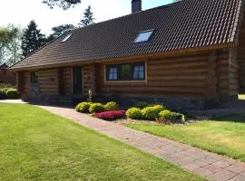The gorgeous log house, that brings out the smile!