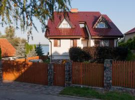 Ferienhaus Malgosia direkt am See, cabaña o casa de campo en Kruklanki