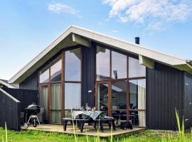 8 person holiday home in Ulfborg、Thorsmindeの別荘