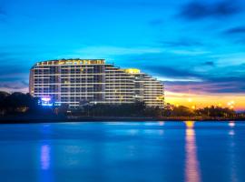 Haikou Bay Hengda Yige Holiday Condo Hotel, condo em Haikou