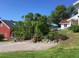 Sandbrekke gjestegård, hotel v destinaci Skjærhollen