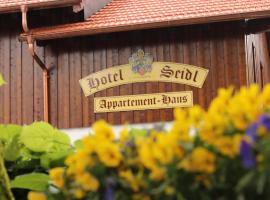 Hotel Seidl, недорогой отель в городе Straßlach-Dingharting