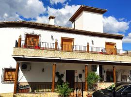 Casa amplia con terraza en La Viñuela, vacation home in Viñuela