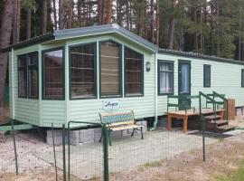 Romantic HOLIDAY HOME in the pine forest, hótel í Skulte