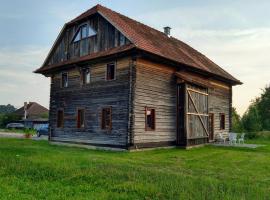 Wooden Barn, cabaña o casa de campo en Zăbala