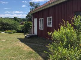 Gårdshus på Kilagårds Gröna, casa rústica em Heberg